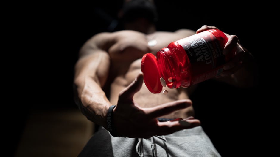 athlete taking creatine supplement muscle building