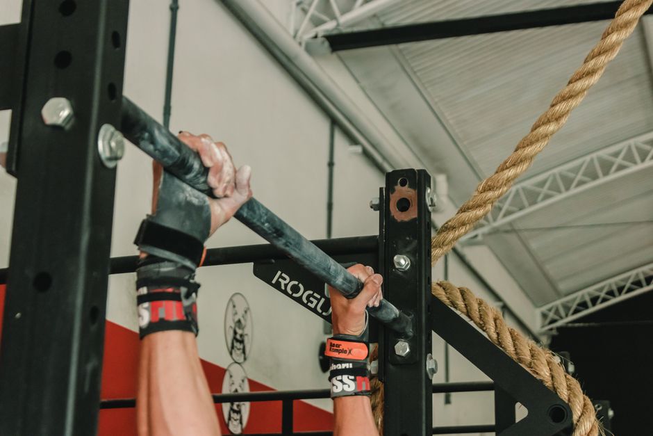 hands gripping rope close-up gym