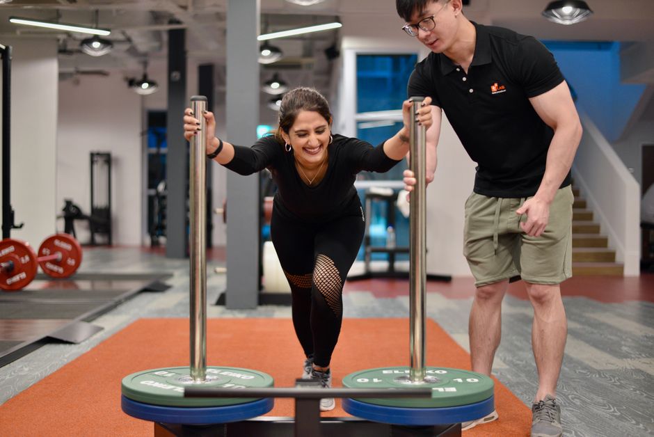 athlete sled push stride biomechanics training