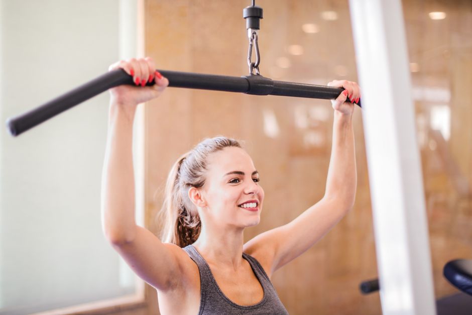 rowing machine elbow position lat muscles fitness