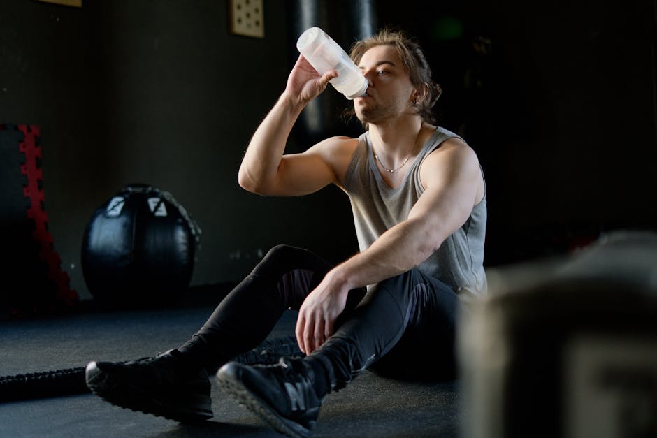 athlete drinking cold water after exercise exhaustion