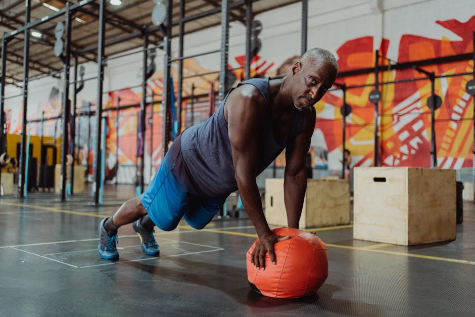 functional fitness athlete performing wall balls with controlled tempo