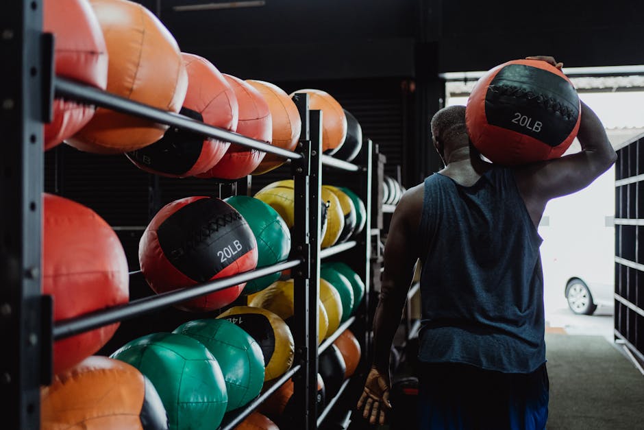sandbag carry athlete proper posture