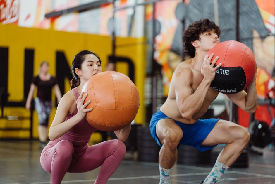 glute activation squat wall ball exercise athlete